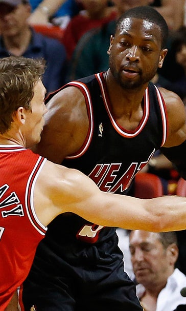 LeBron-less Heat beat Bulls behind Wade, Bosh